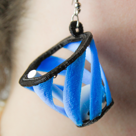 Illustration for article titled These 3D-Printed Earrings Catch Apple's AirPods When They Fall Out
